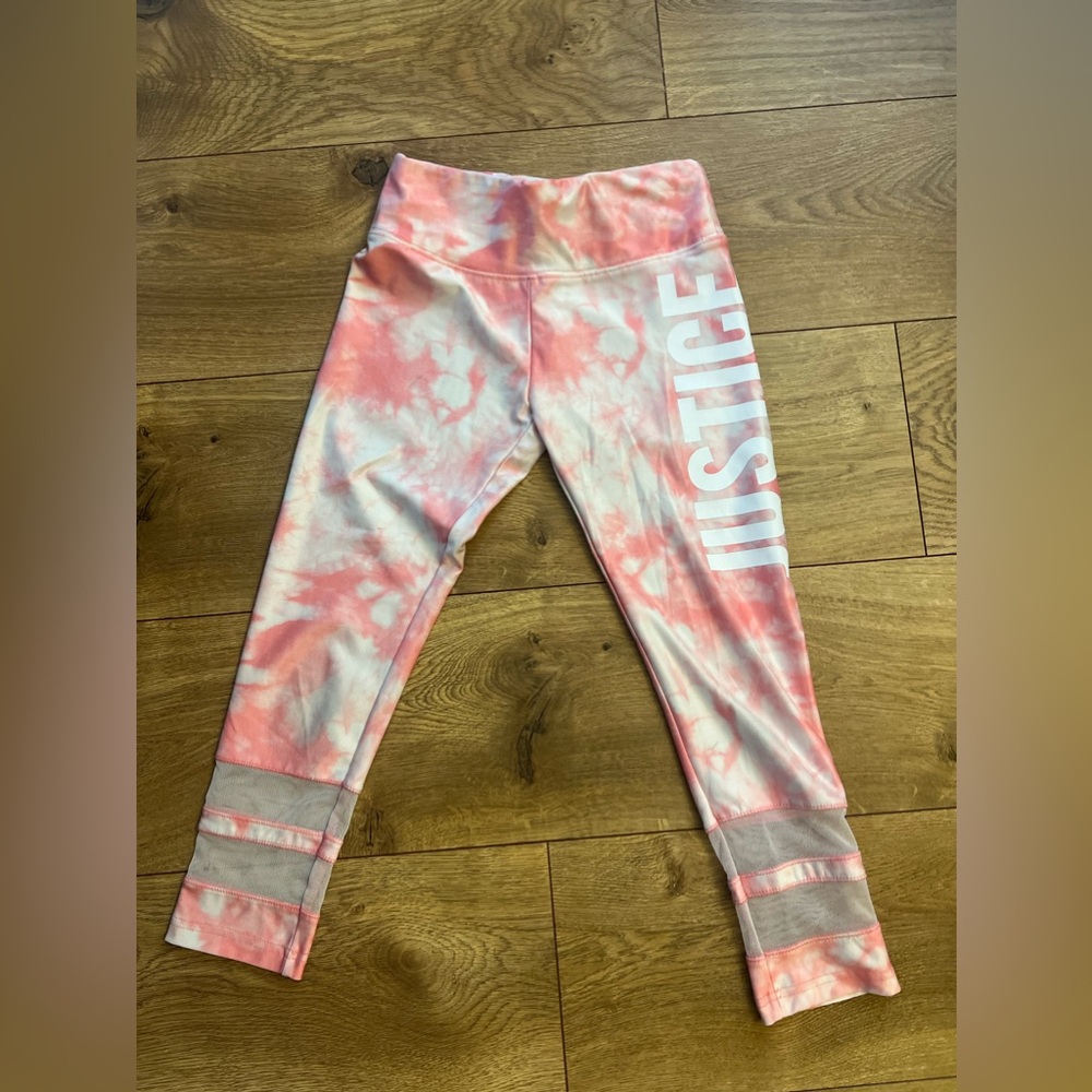 Justice peach leggings, mesh detail on the bottom size 10